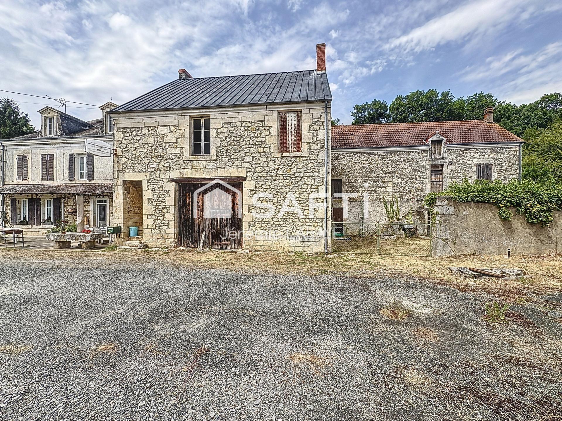 Grande maison avec dépendances et vaste terrain !