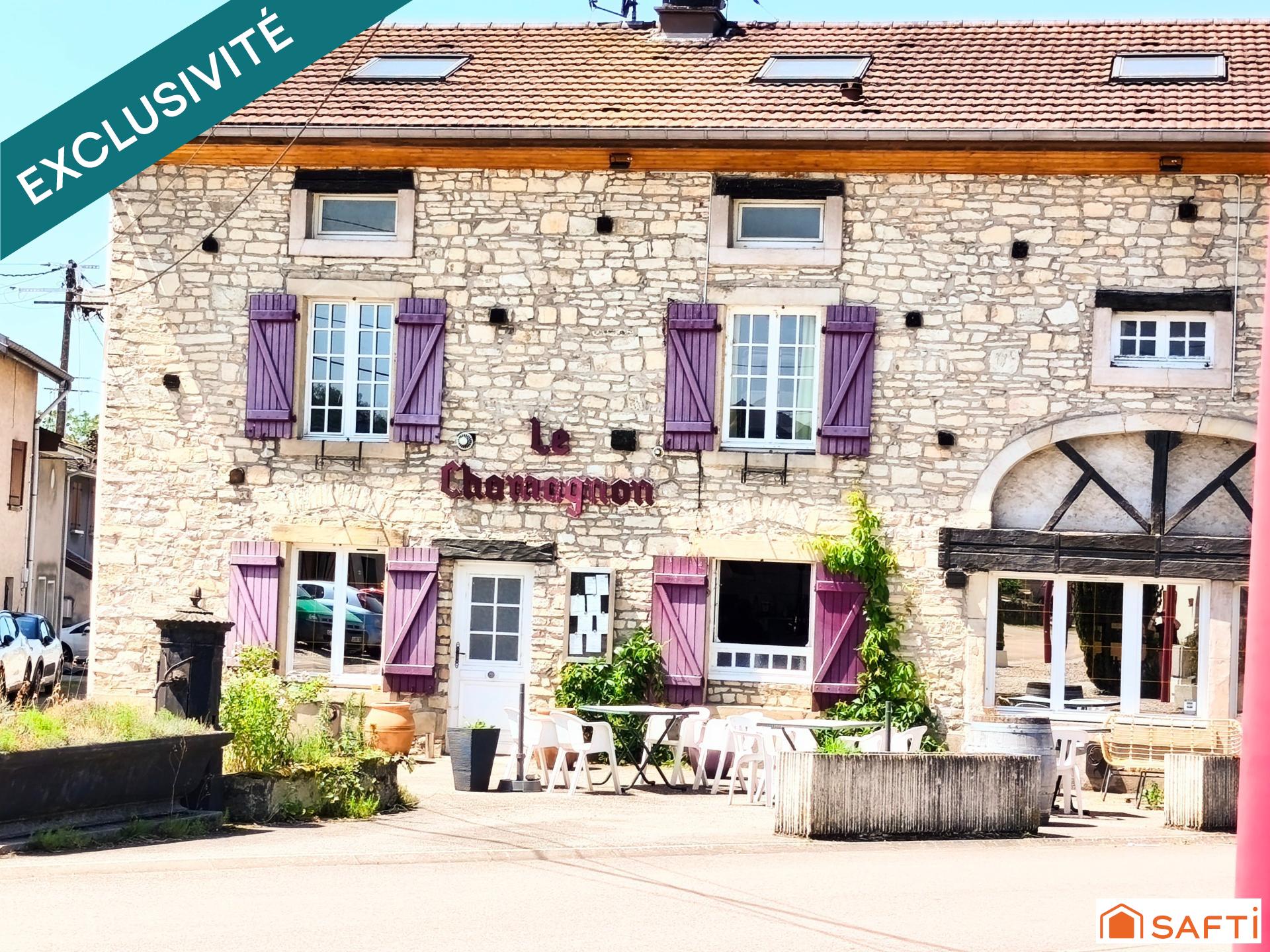 Murs commerciaux comprenant restaurant gastronomique réputé, appartement de fonction et terrain constructible