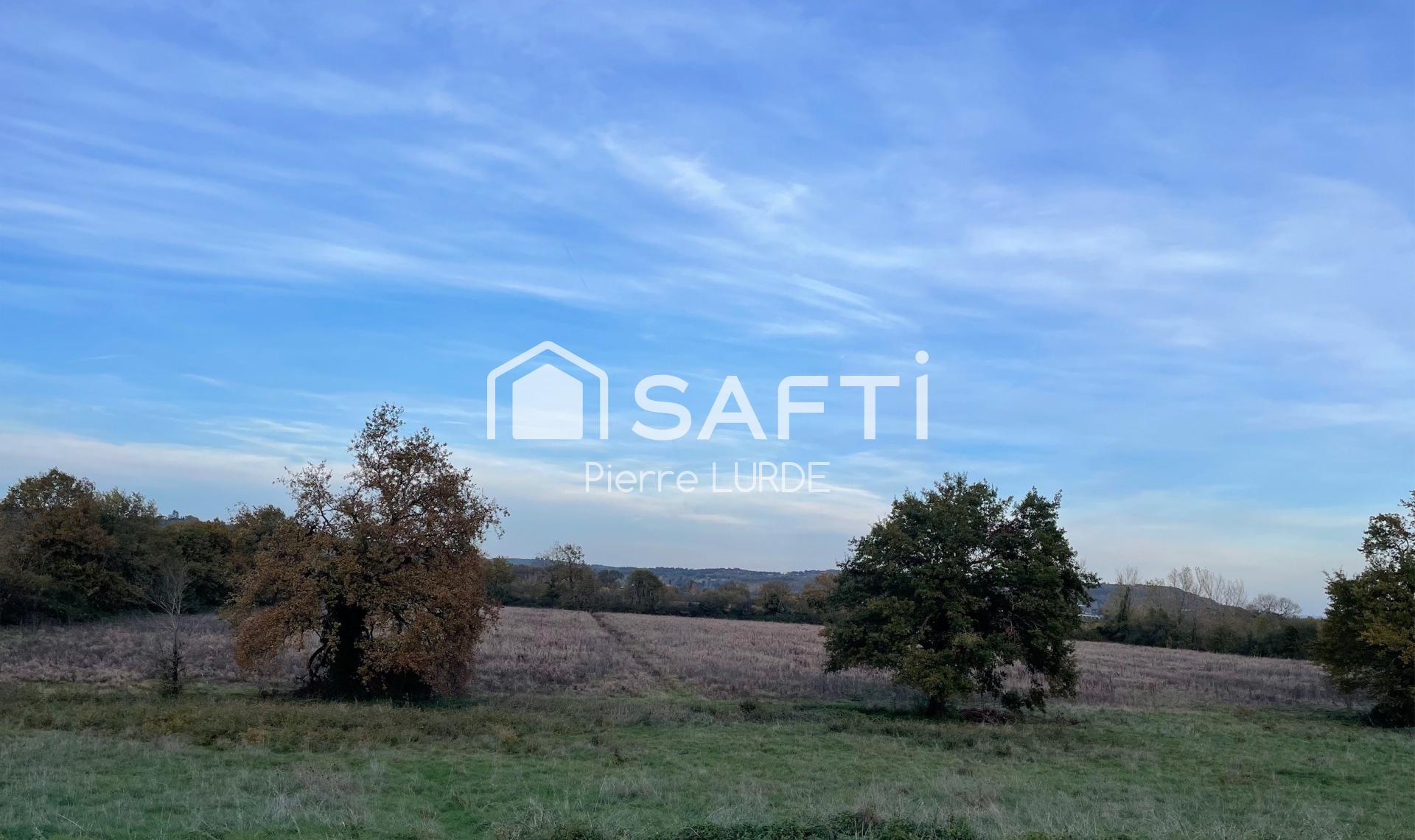 Terrain agricole de 7,8 hectares avec une marre