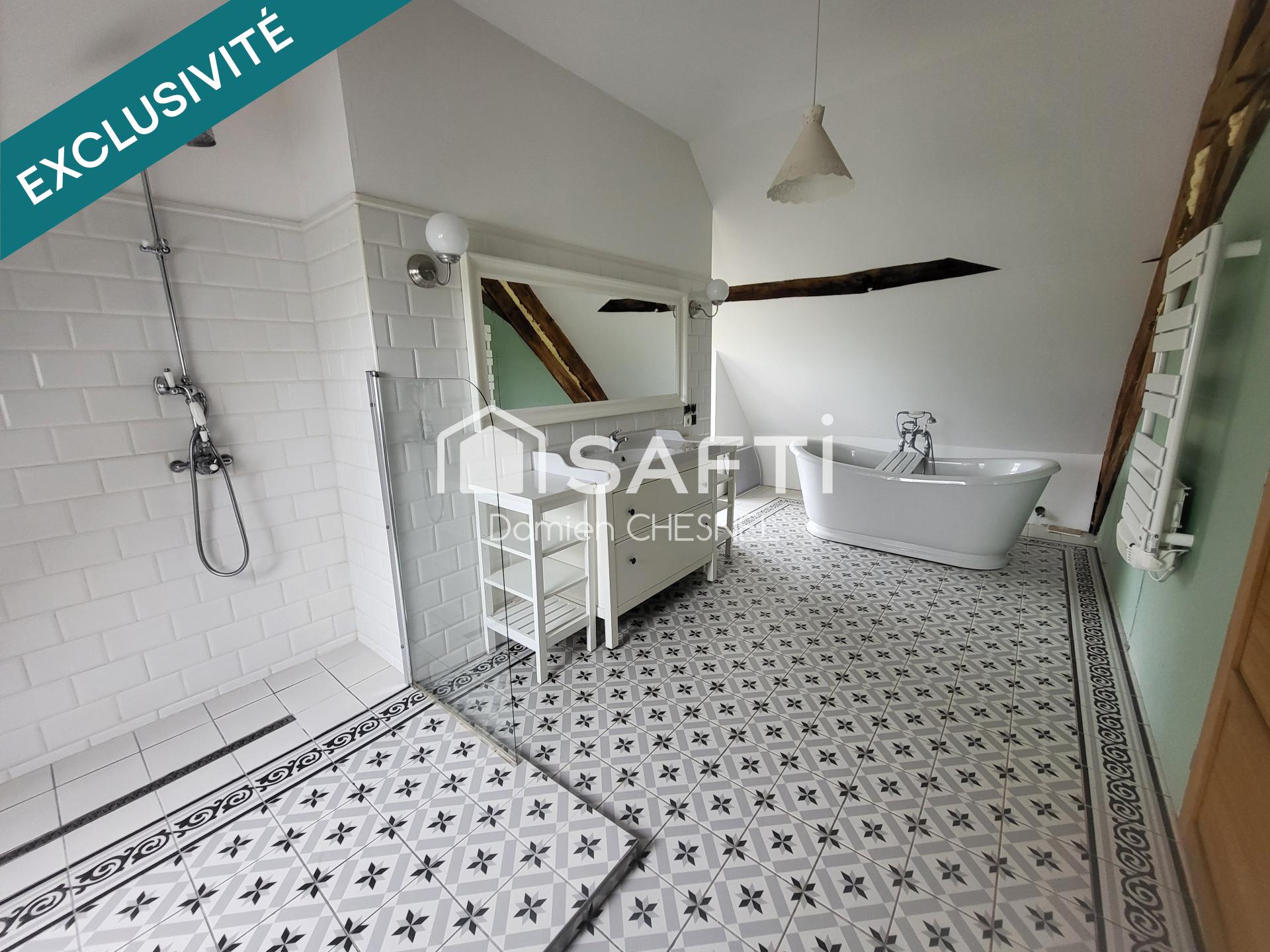 Fermette avec grange et 2,5 hectares de terrain