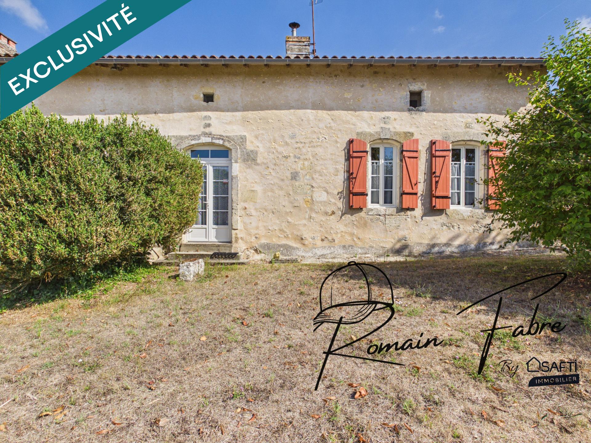 Maison en pierre de 230 m2 avec 4 chambres, garage attenant et arrières chais
