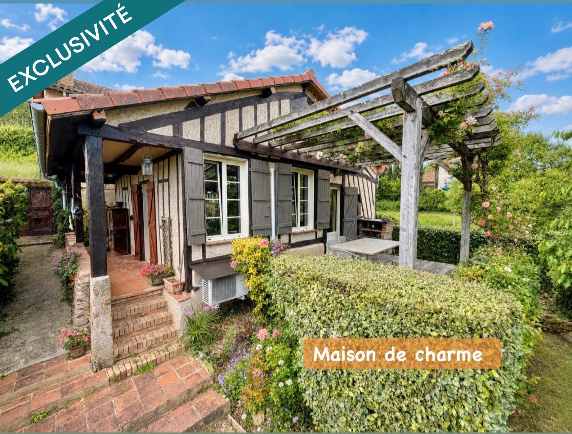 MAISON DE CARACTERE AVEC JARDIN ET GARAGE