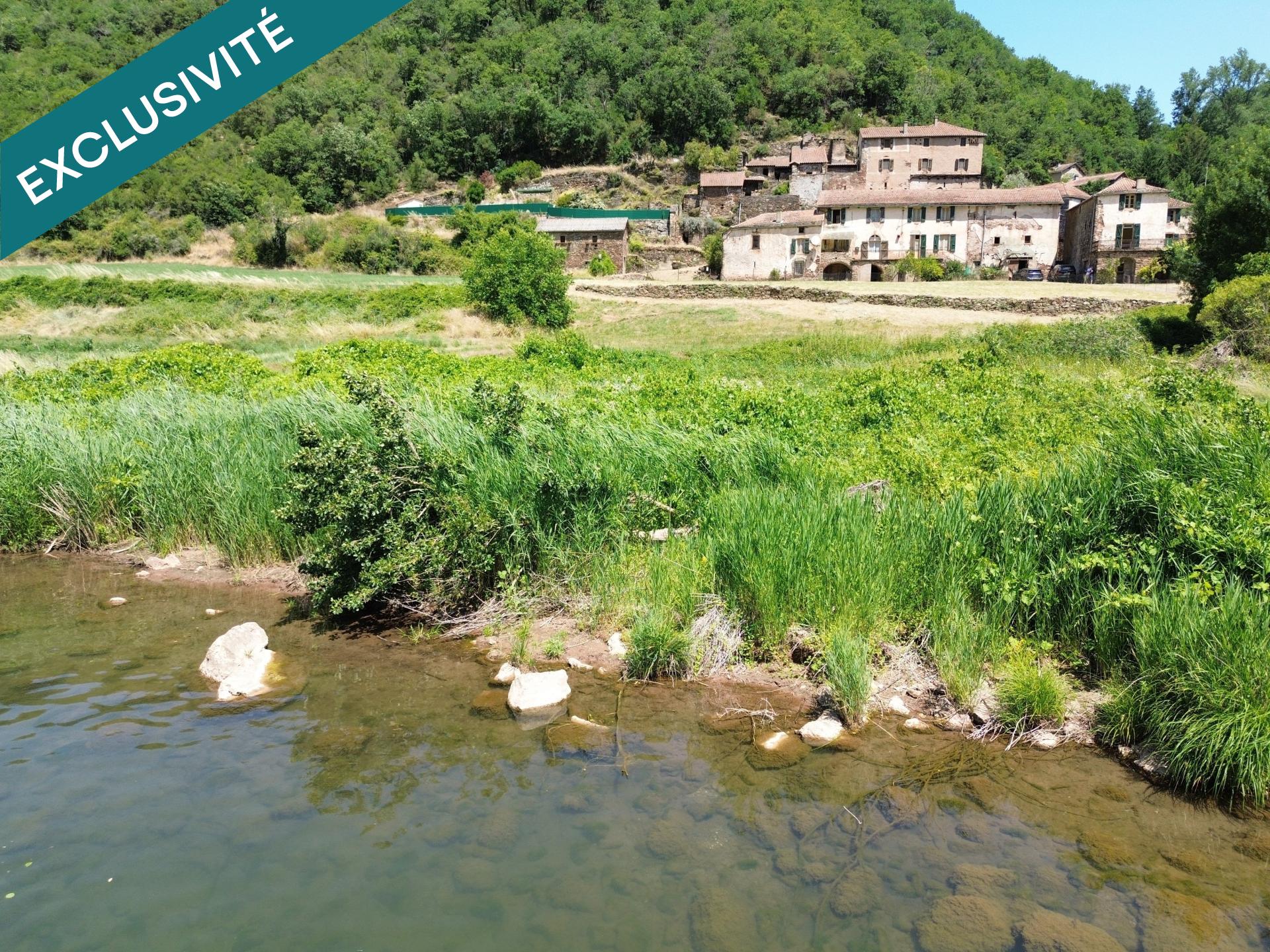 Ancienne propriété agricole autosuffisante en bord de Tarn avec 17 Ha à rénover