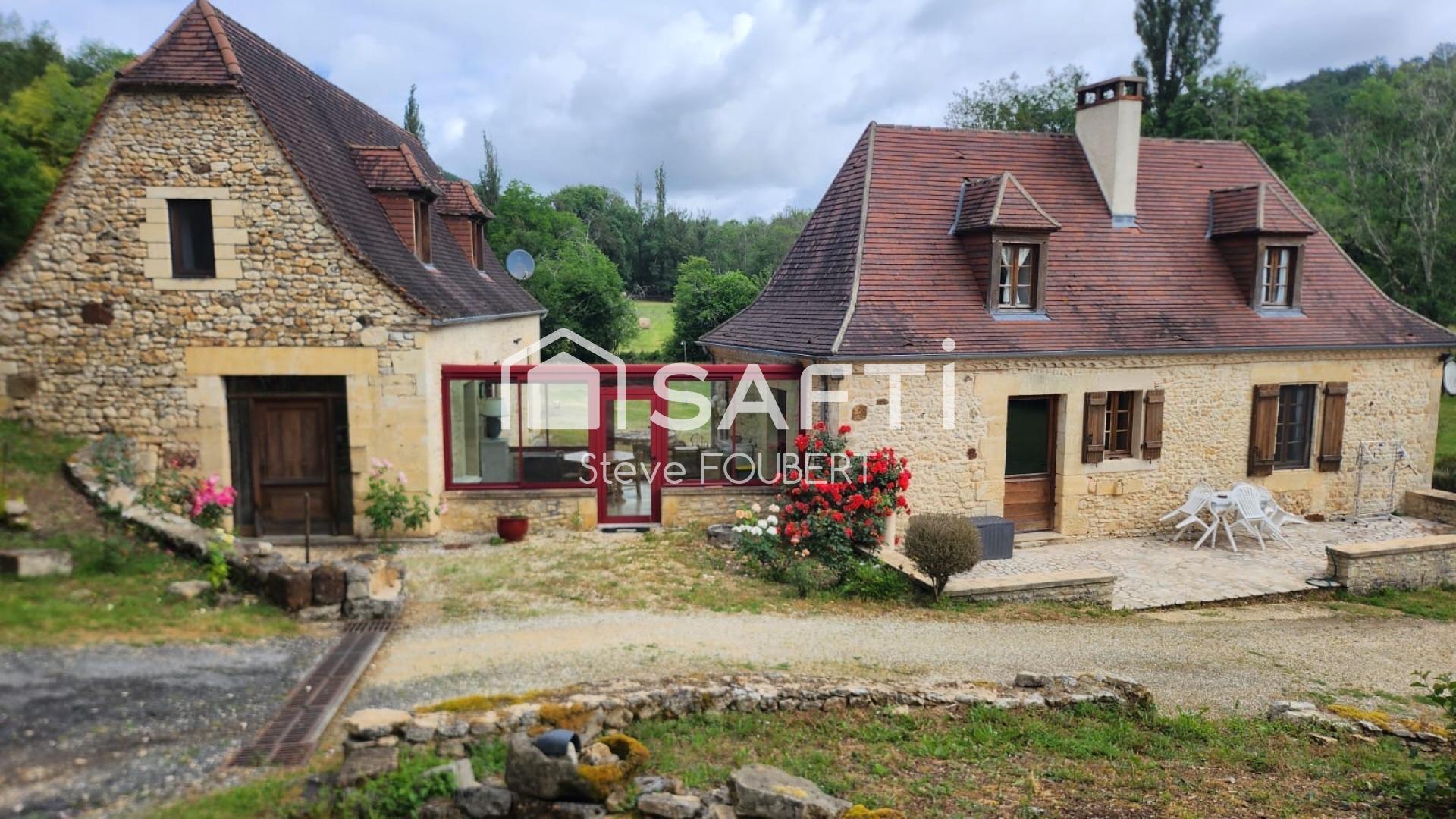 Ancien moulin avec ruisseau sur la propriété