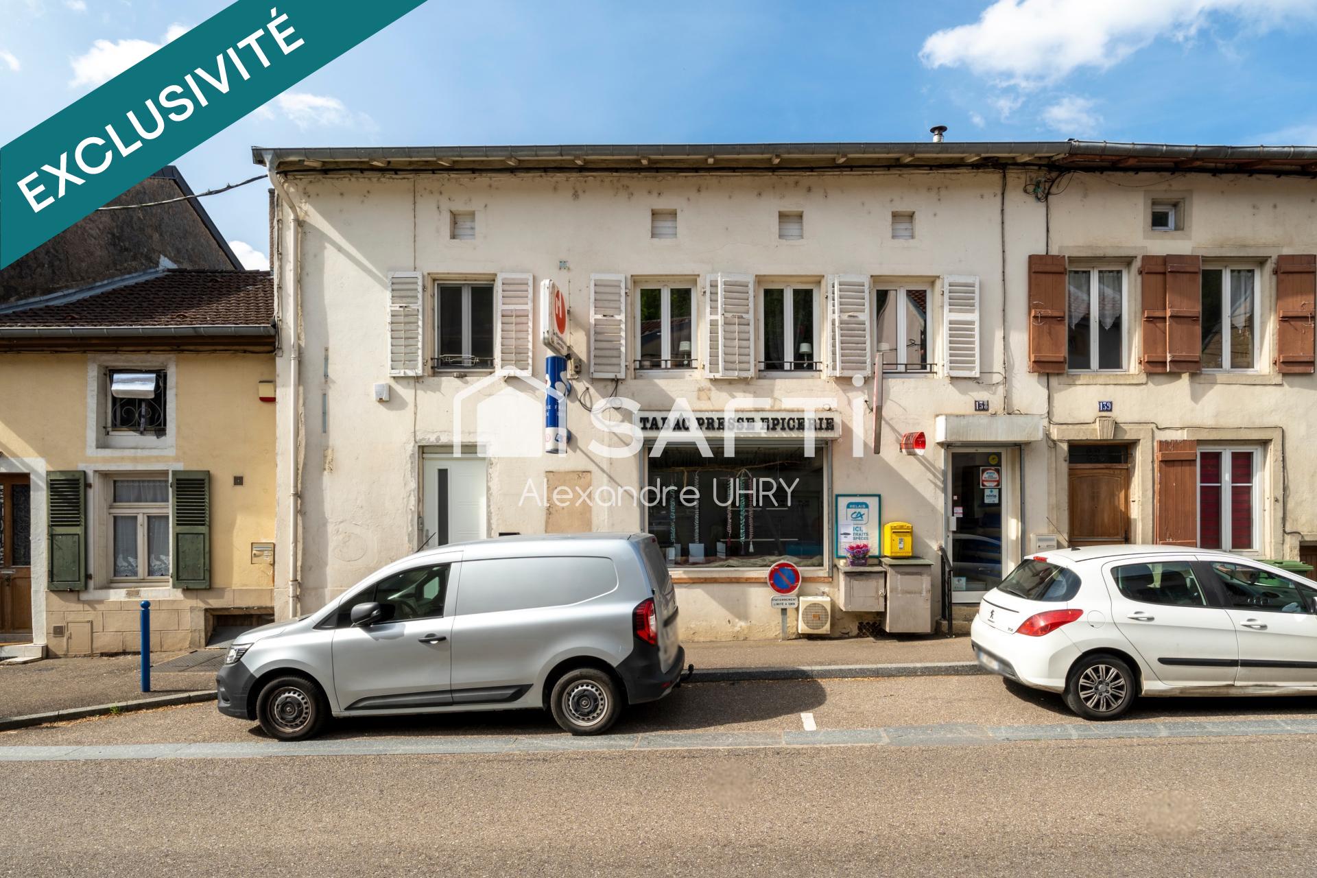 Immeuble de 200 m2 avec un grand garage !