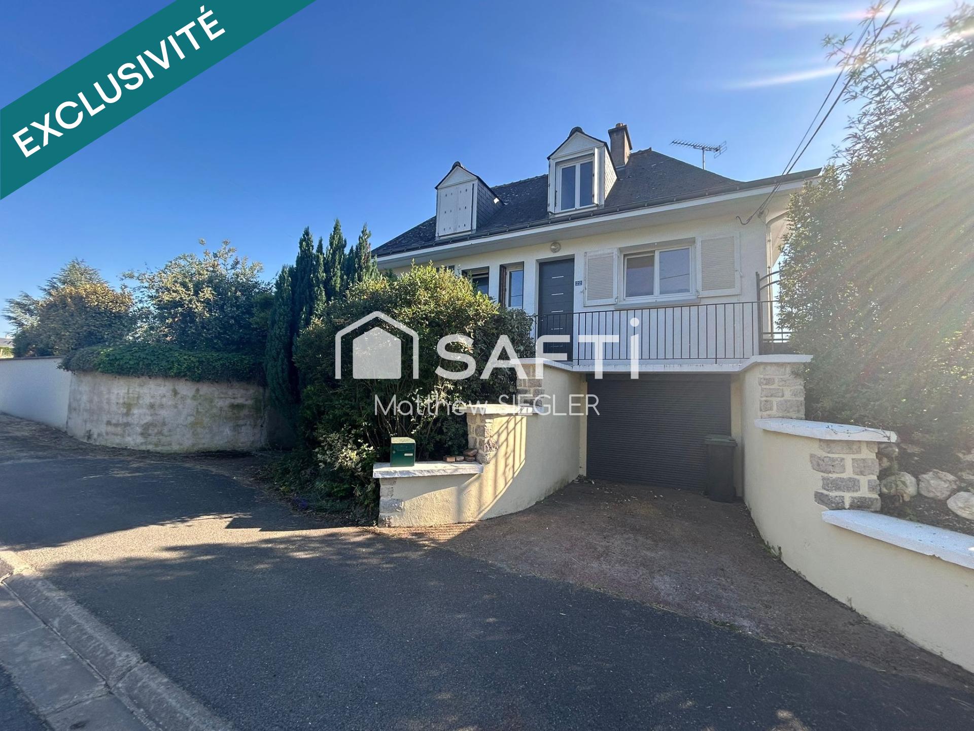 Maison familiale de 116 m² avec 4 chambres, sous-sol complet, terrain arboré de 1 077 m² et équipements énergétiques performants