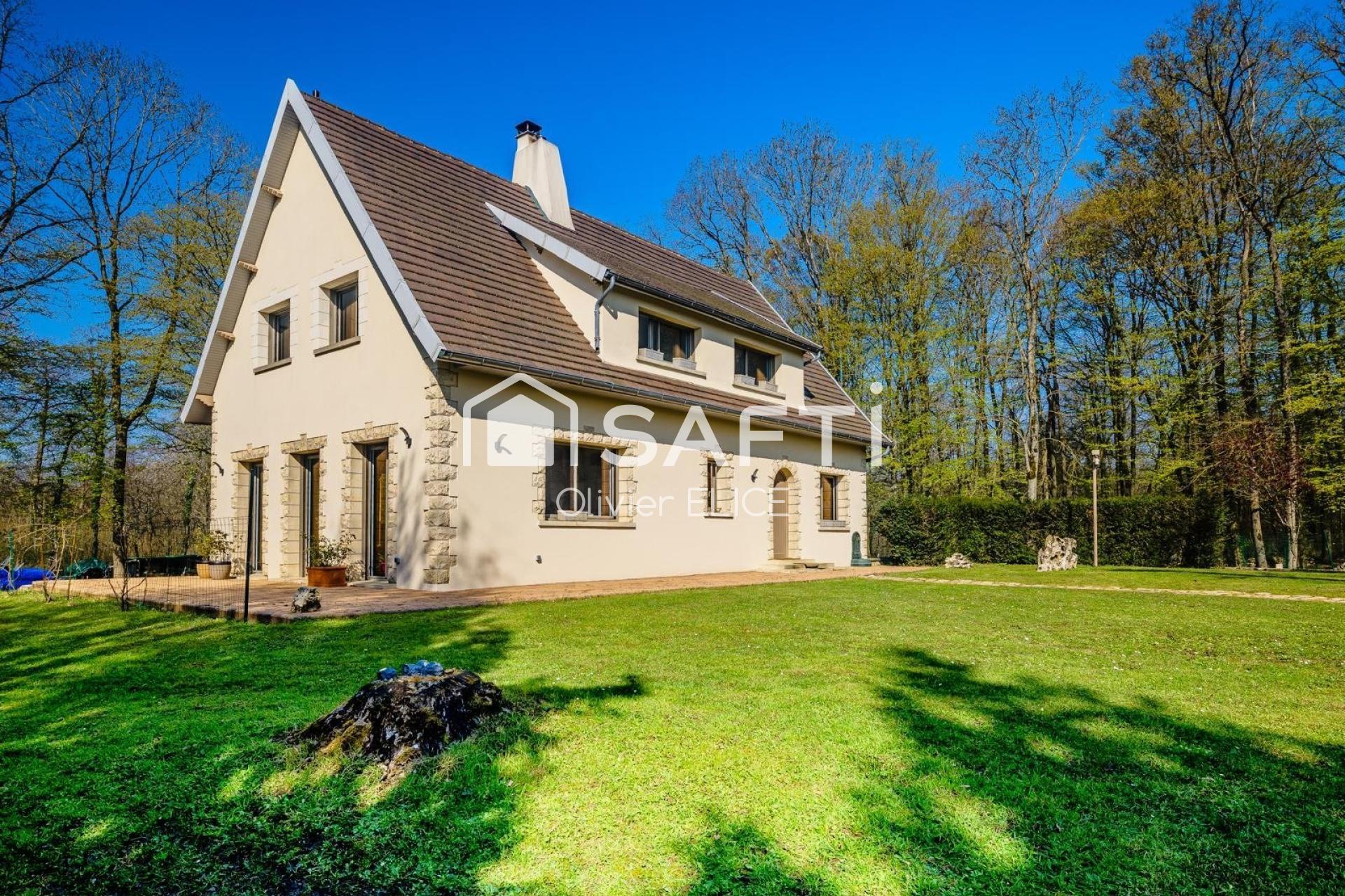 Belle maison dans son écrin de verdure