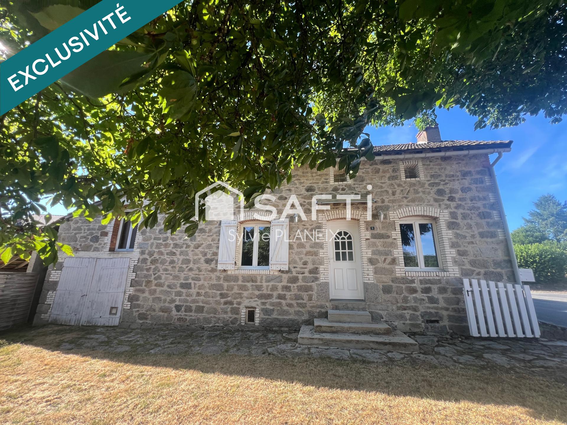 Maison de charme avec garage et terrain de 320 m2.