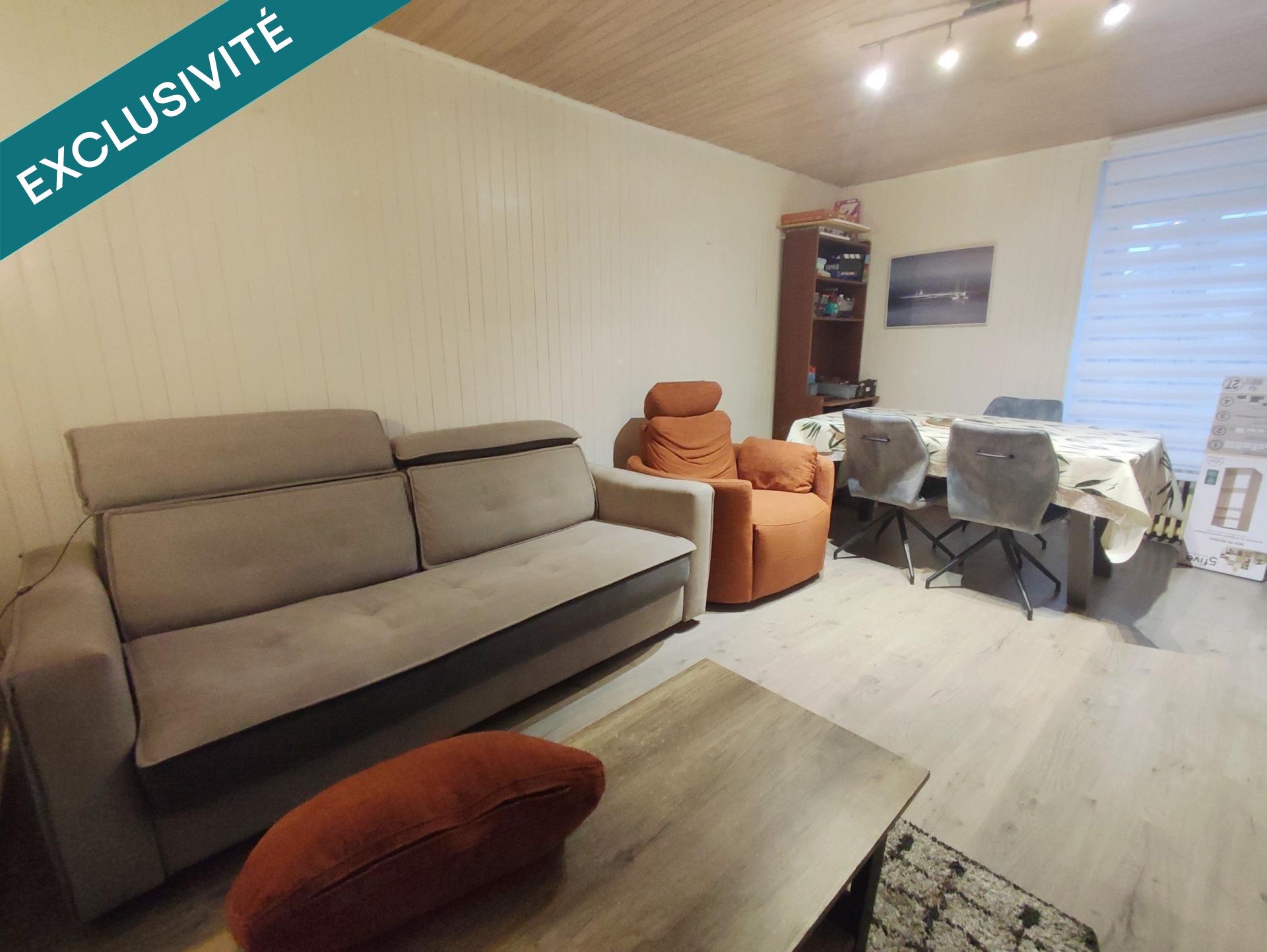 Immeuble de rapport avec local commercial, appartement et cour – Centre-bourg de Taulé