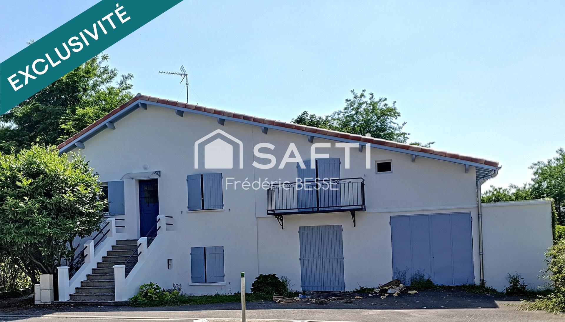Maison T6 125m² avec garages et jardin de 2200m².