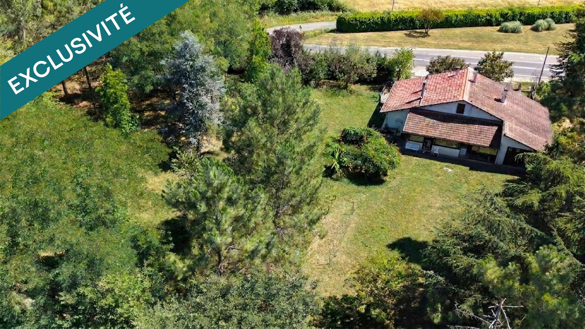 CHARMANTE MAISON SUR UN GRAND TERRAIN
