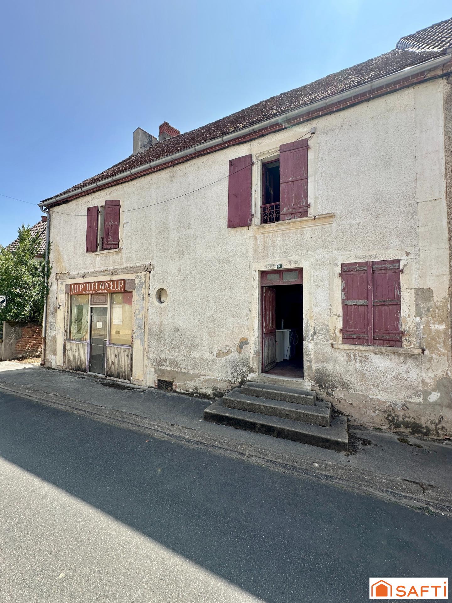 Maison de bourg avec 3 chambres, cave et dépendance
