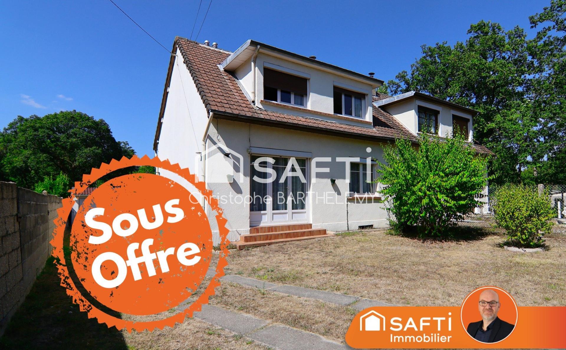 Maison mitoyenne 72m2 2 chambres sur sous-sol et grand jardin donnant sur le lac