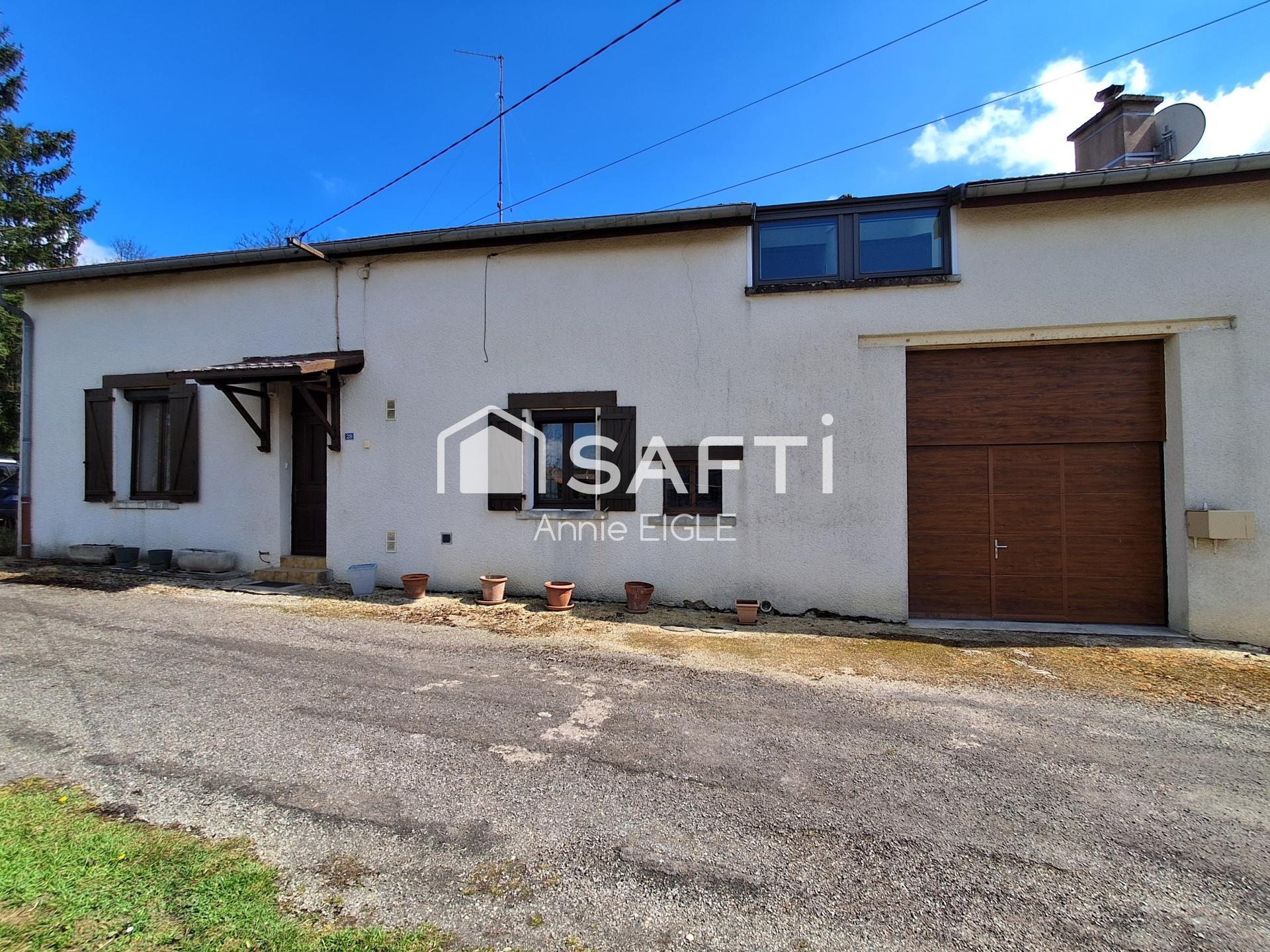 200 m2 habitables, grand garage et grand terrain