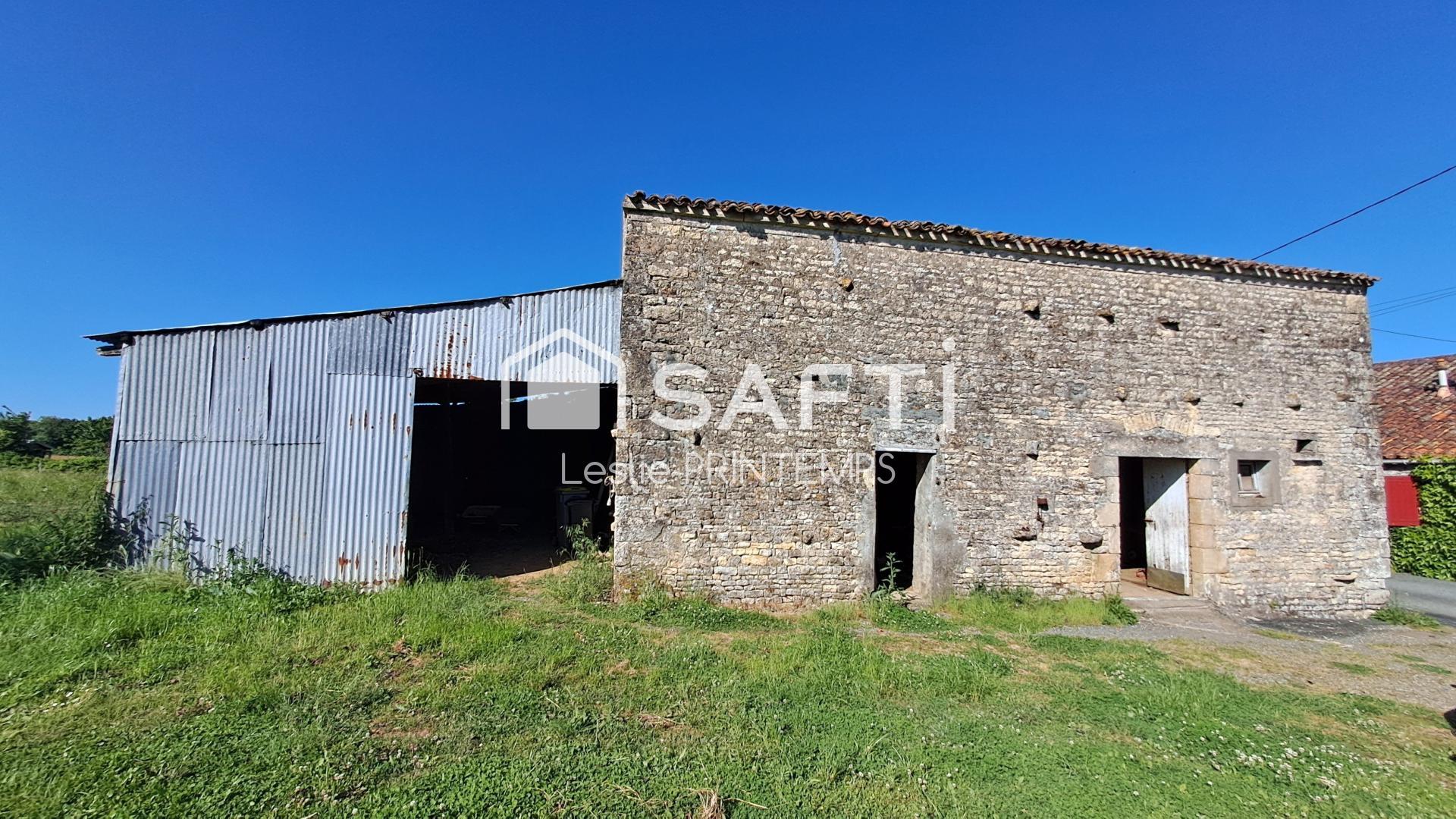 Grange à rénover sur 1500 m² de terrain constructible