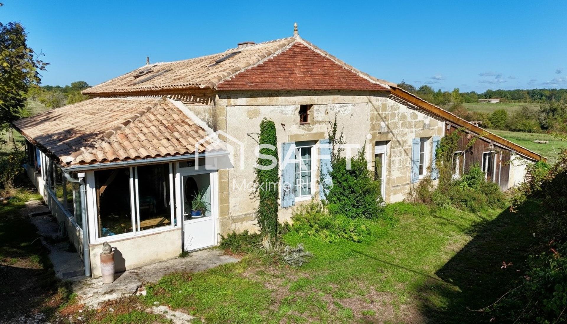 Belle propriété en pierre rénovée avec 5,5 hectares, dépendances et studio indépendant