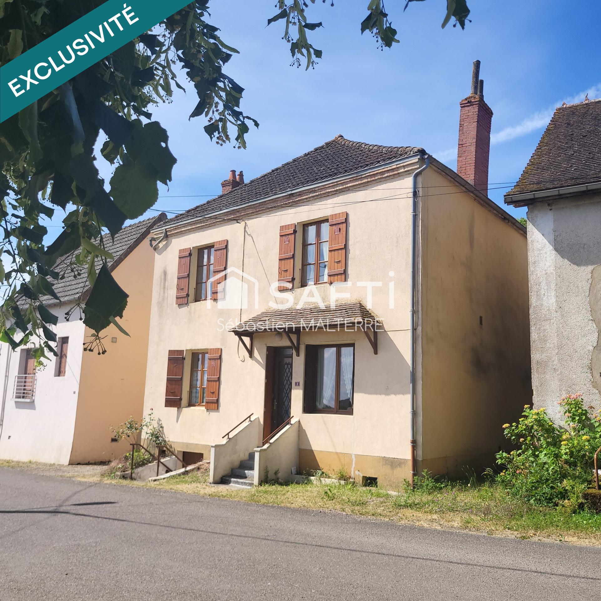 Ensemble immobilier avec grange et écurie