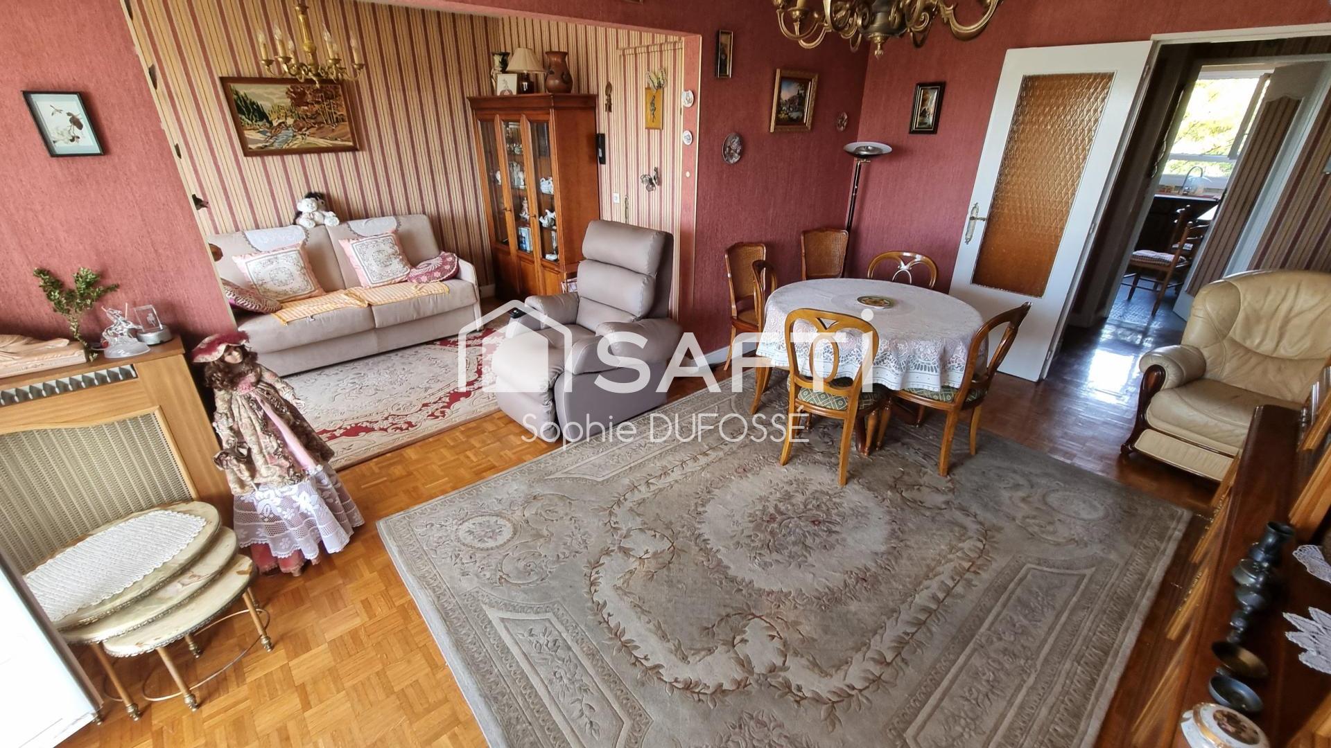 Proche commerces et gare, Appartement T3 de 63,02 m2 avec balcon filant, cave et place de parking intérieure