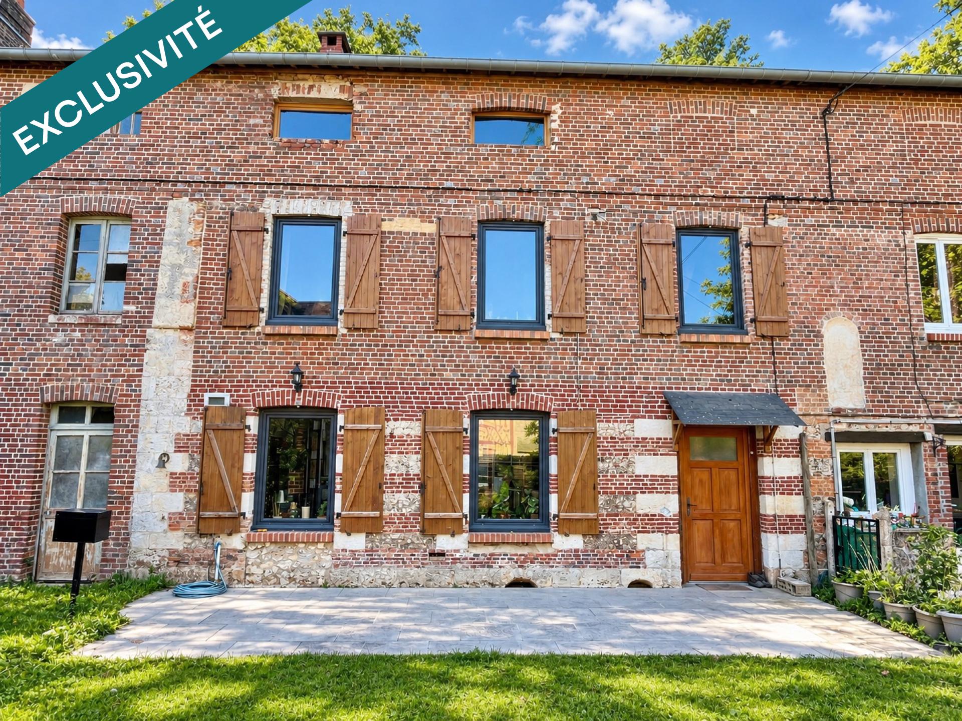 Charmante maison en brique dans un secteur calme.