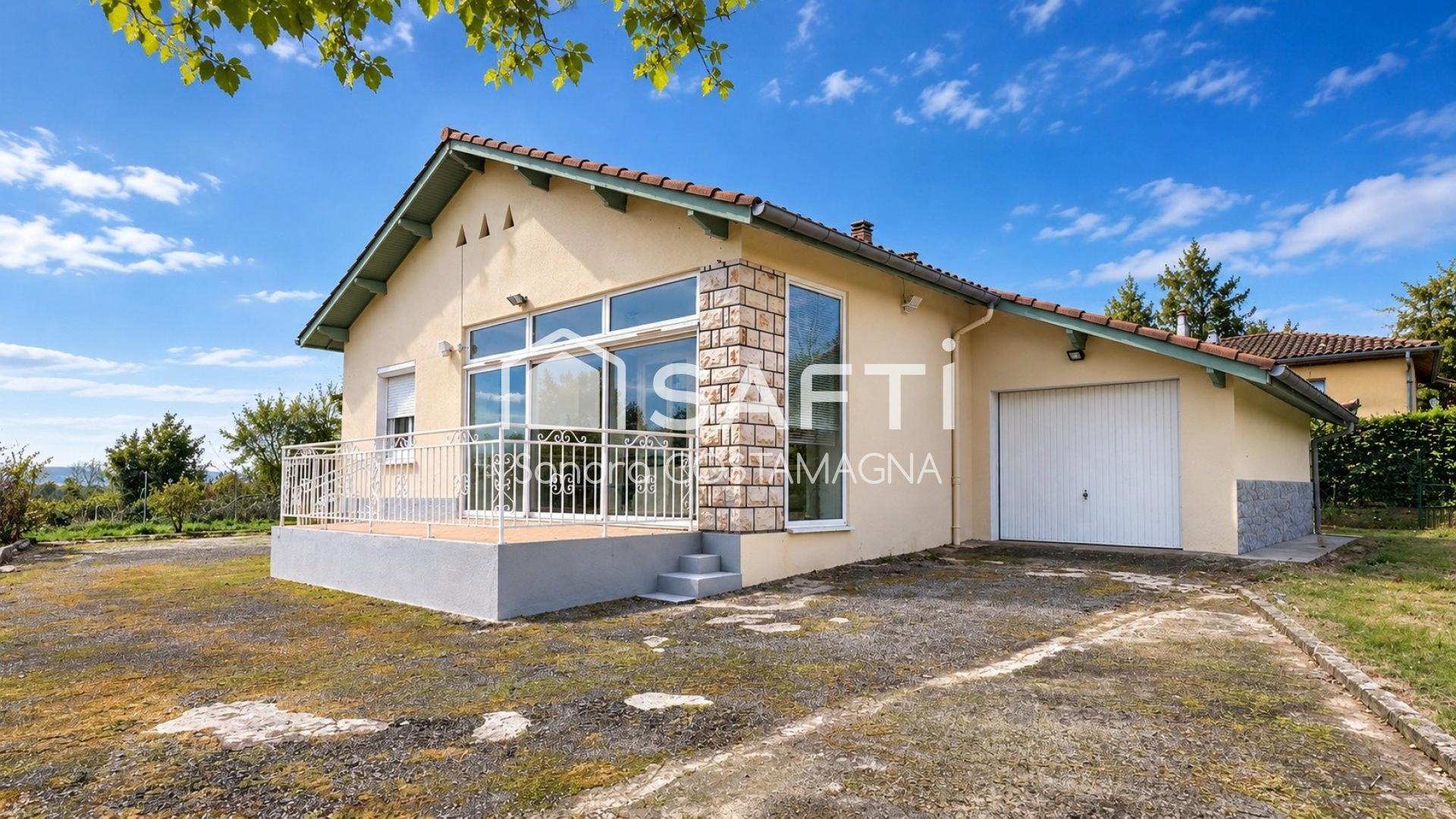 Maison avec garage et beau jardin