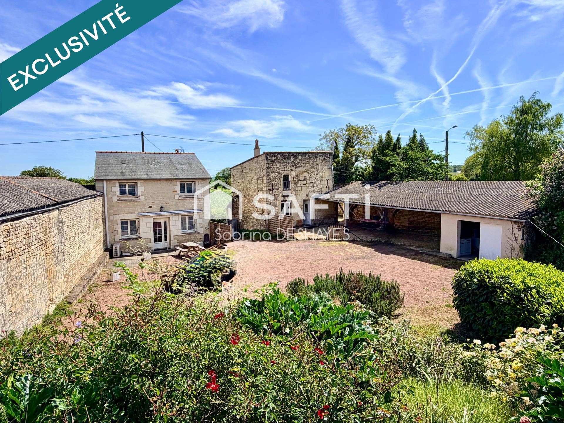 ENSEMBLE IMMOBILIER COMPOSÉ DE 2 MAISONS, CAVE, GARAGE ET JARDIN CLOS
