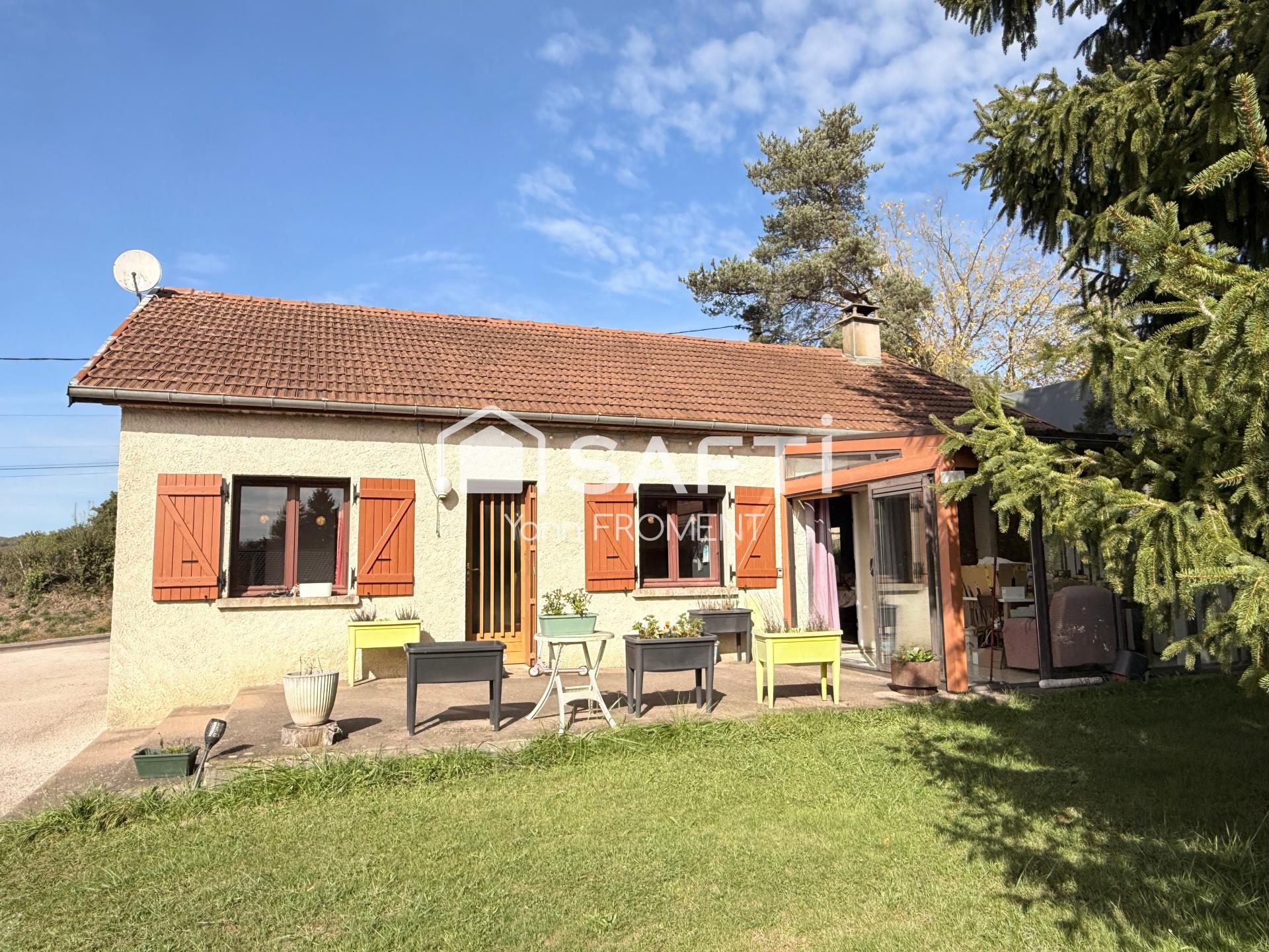 Maison de 1980, 70 m2, 2 ch garage et terrain